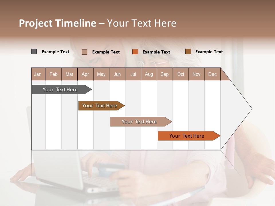 An Elderly Couple Looking At A Laptop Computer PowerPoint Template