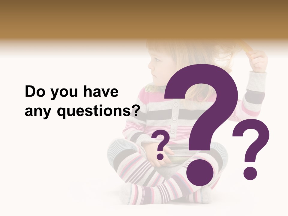 A Little Girl Sitting On The Floor With Her Hair Blowing In The Wind PowerPoint Template