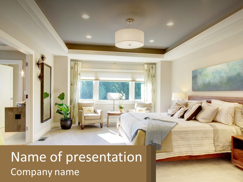 A Bedroom With A Large Bed And A Painting On The Wall PowerPoint Template