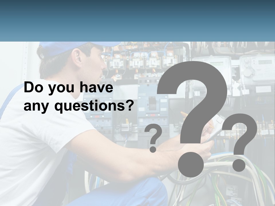 A Man In Overalls And A Blue Cap Is Working On An Electrical Panel PowerPoint Template