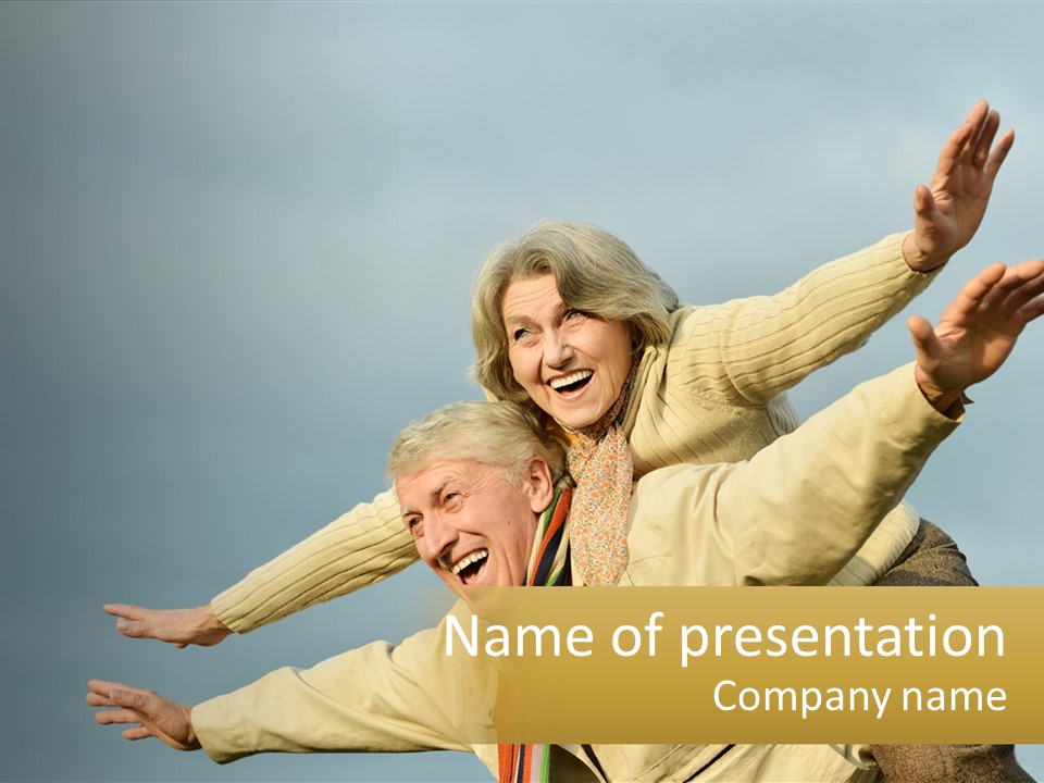 A Man And Woman Are Holding Each Other In The Air PowerPoint Template