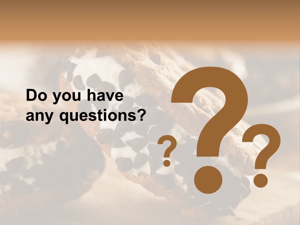 A Close Up Of A Cookie With Chocolate Chips On It PowerPoint Template