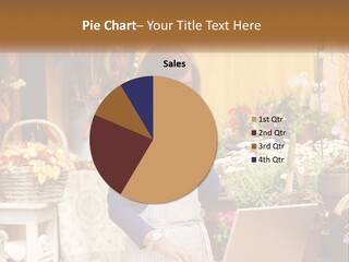 A Woman Talking On A Cell Phone In A Flower Shop PowerPoint Template