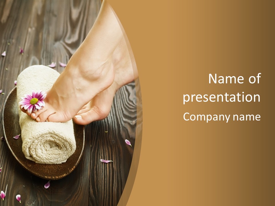 A Woman's Foot On Top Of A Towel On A Wooden Table PowerPoint Template