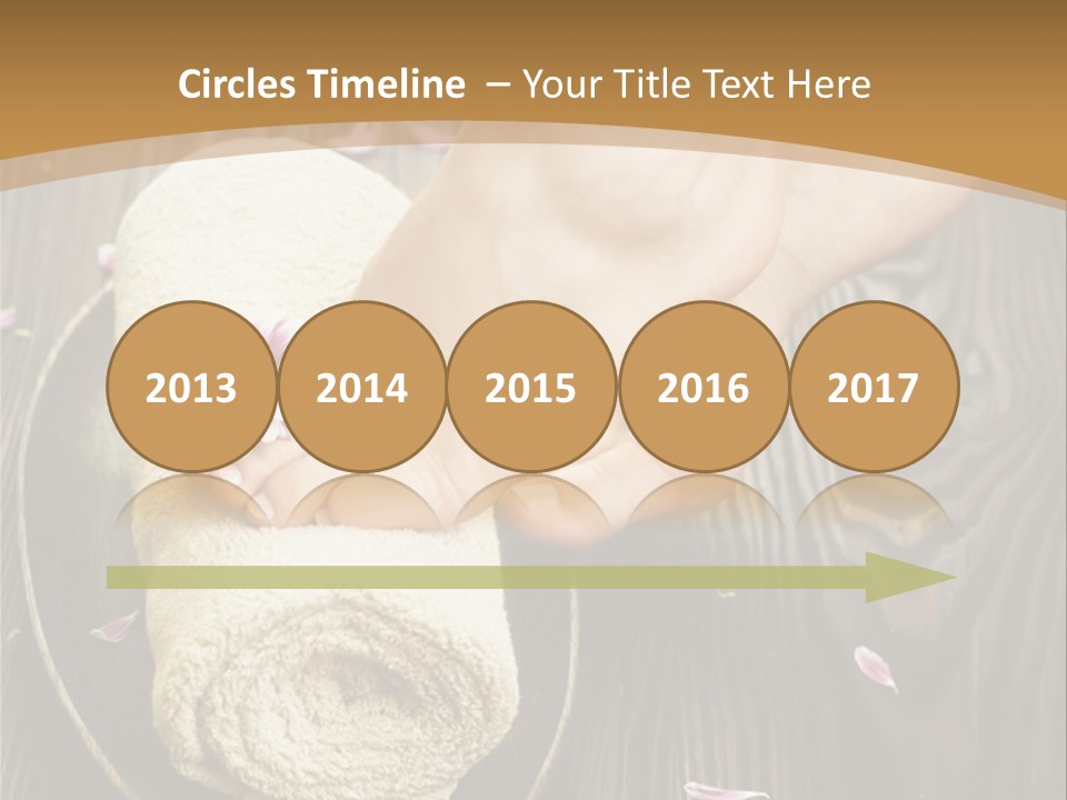 A Woman's Foot On Top Of A Towel On A Wooden Table PowerPoint Template