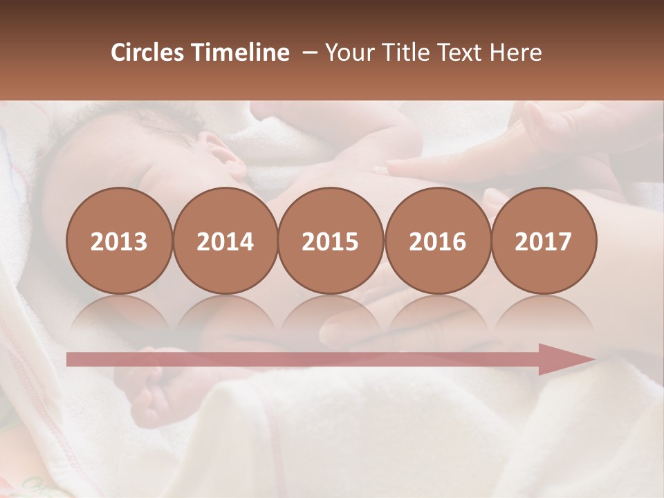 A Baby Laying On A Blanket Being Held By A Person PowerPoint Template