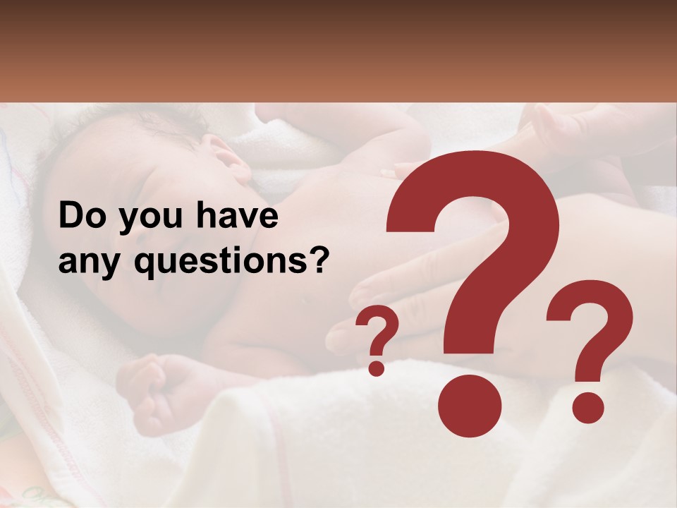 A Baby Laying On A Blanket Being Held By A Person PowerPoint Template