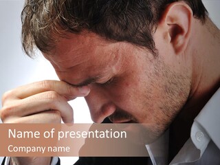 A Man Holding His Hand To His Face PowerPoint Template