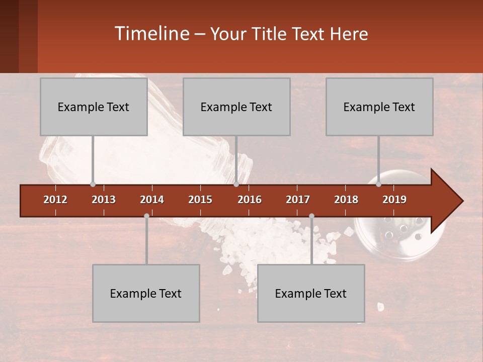 A Salt Shaker And A Scoop Of Salt On A Wooden Table PowerPoint Template
