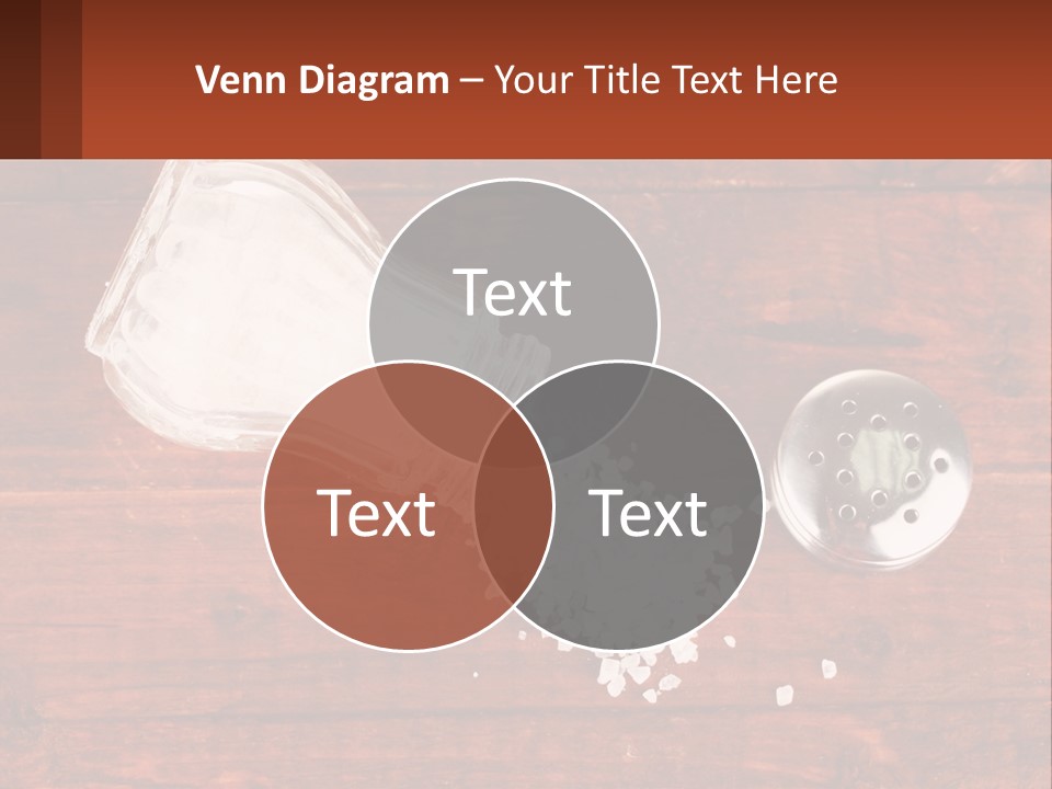 A Salt Shaker And A Scoop Of Salt On A Wooden Table PowerPoint Template