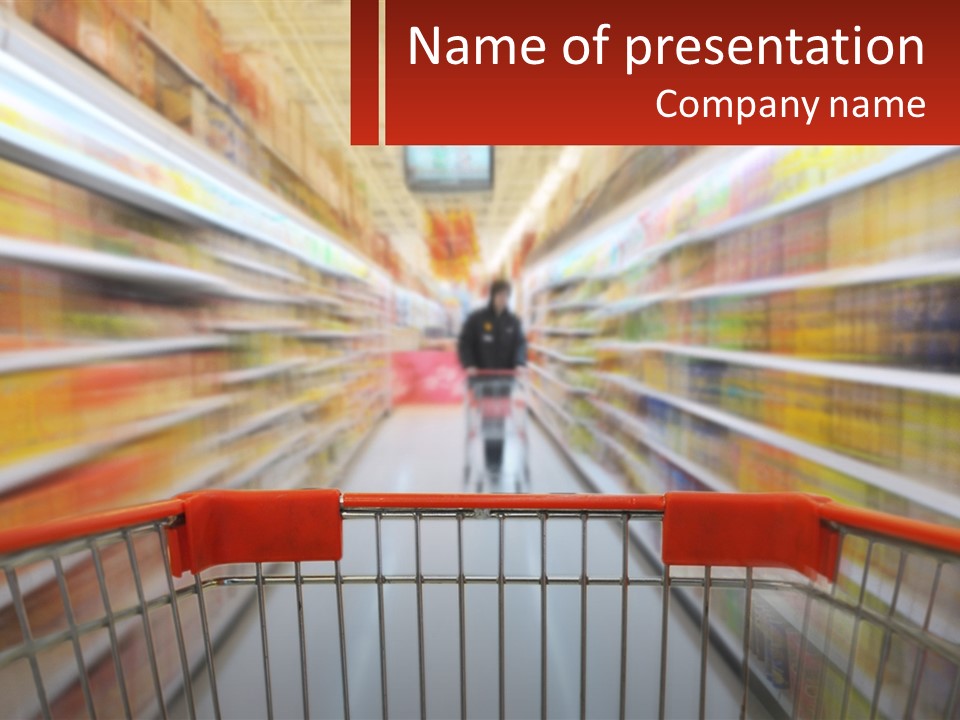 A Shopping Cart In A Store With A Person In The Background PowerPoint Template