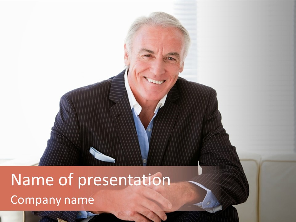 A Man In A Suit Is Holding A Sign PowerPoint Template