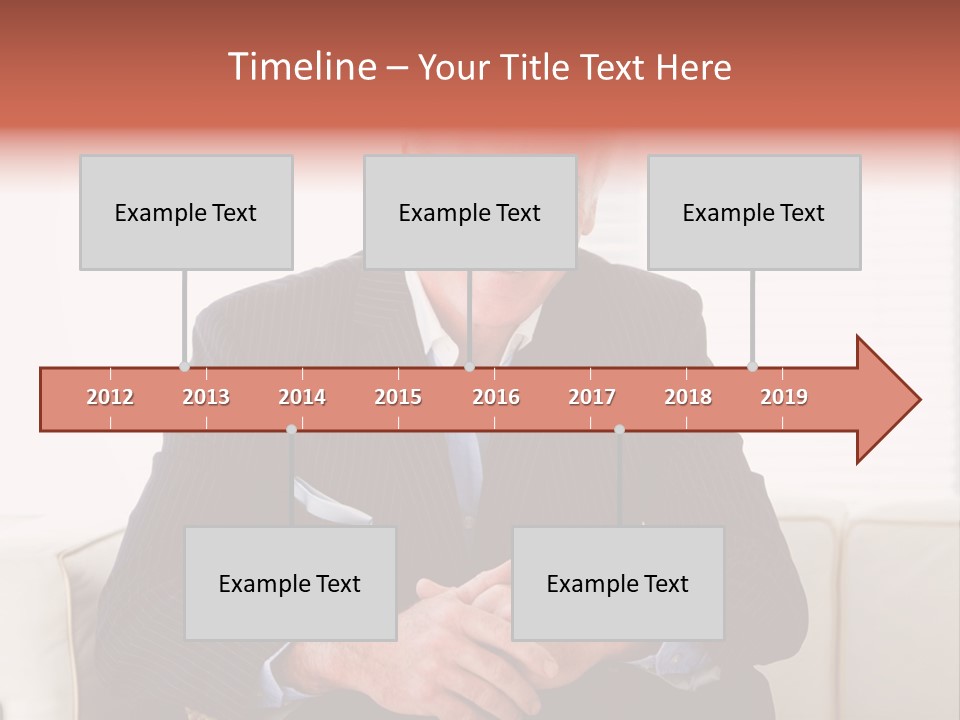 A Man In A Suit Is Holding A Sign PowerPoint Template