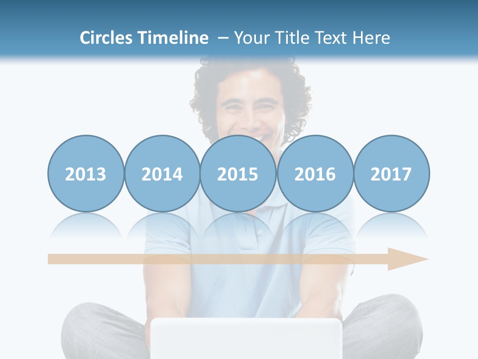 A Man Sitting On The Floor With A Laptop PowerPoint Template