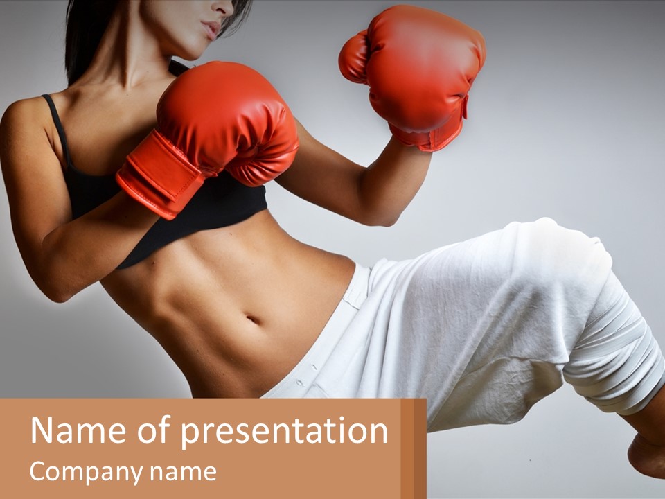 A Woman Wearing Boxing Gloves Is Posing For A Picture PowerPoint Template