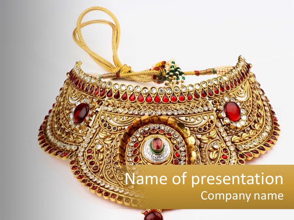 A Gold Necklace With Red Stones On A White Background PowerPoint Template