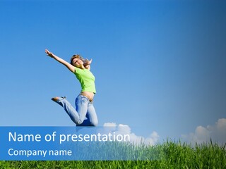 A Woman Jumping In The Air In A Field Of Grass PowerPoint Template