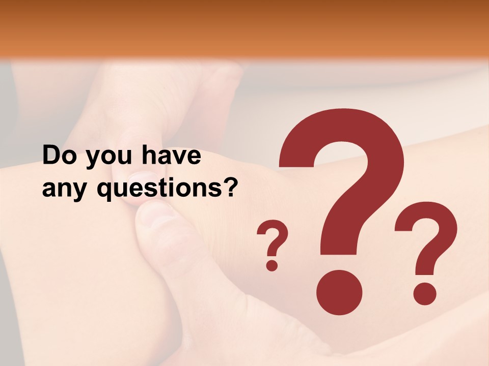 A Woman Getting A Foot Massage From A Man PowerPoint Template