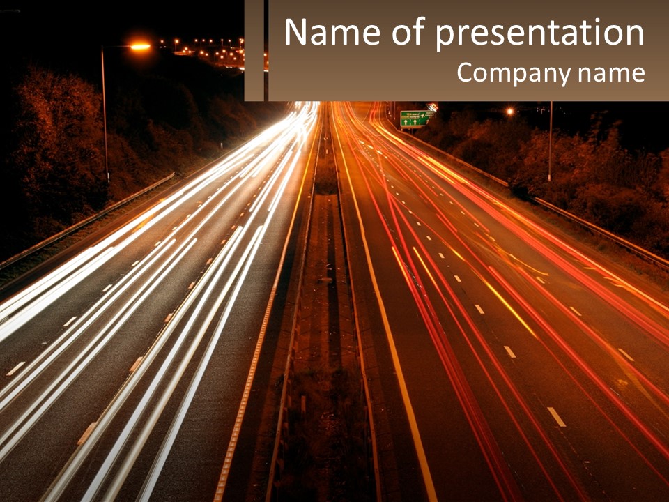 A Long Exposure Picture Of A Highway At Night PowerPoint Template