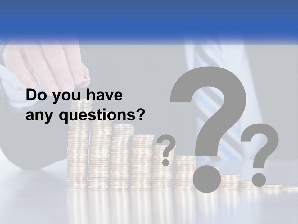 A Business Man Stacking Coins On Top Of A Table PowerPoint Template