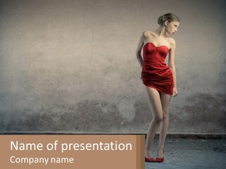 A Woman In A Red Dress Is Standing In Front Of A Wall PowerPoint Template