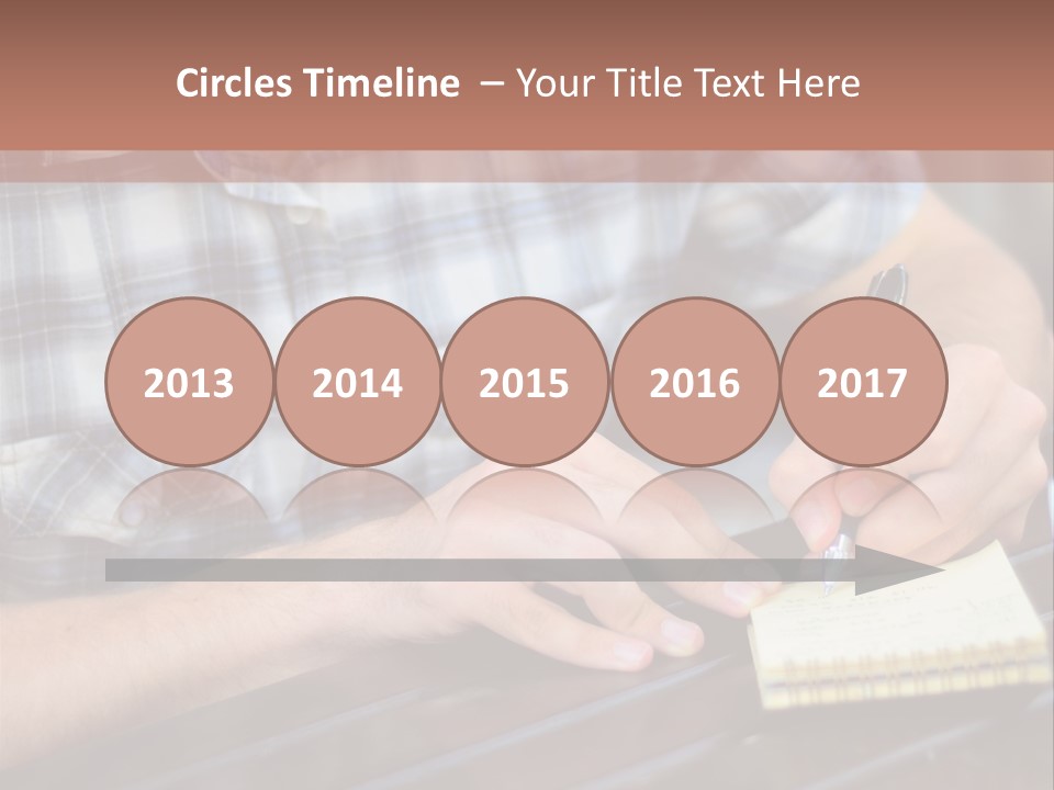 A Man Writing On A Piece Of Paper With A Pen PowerPoint Template