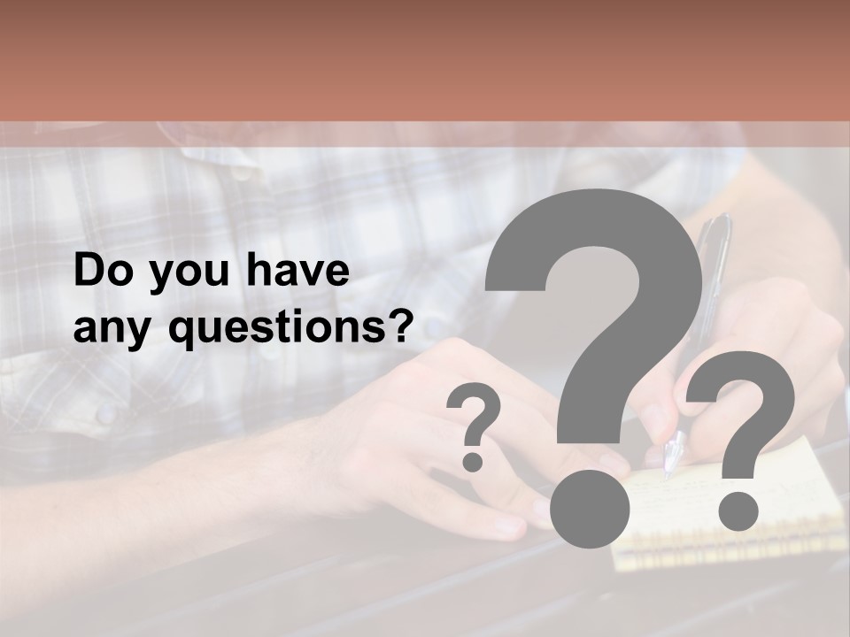 A Man Writing On A Piece Of Paper With A Pen PowerPoint Template