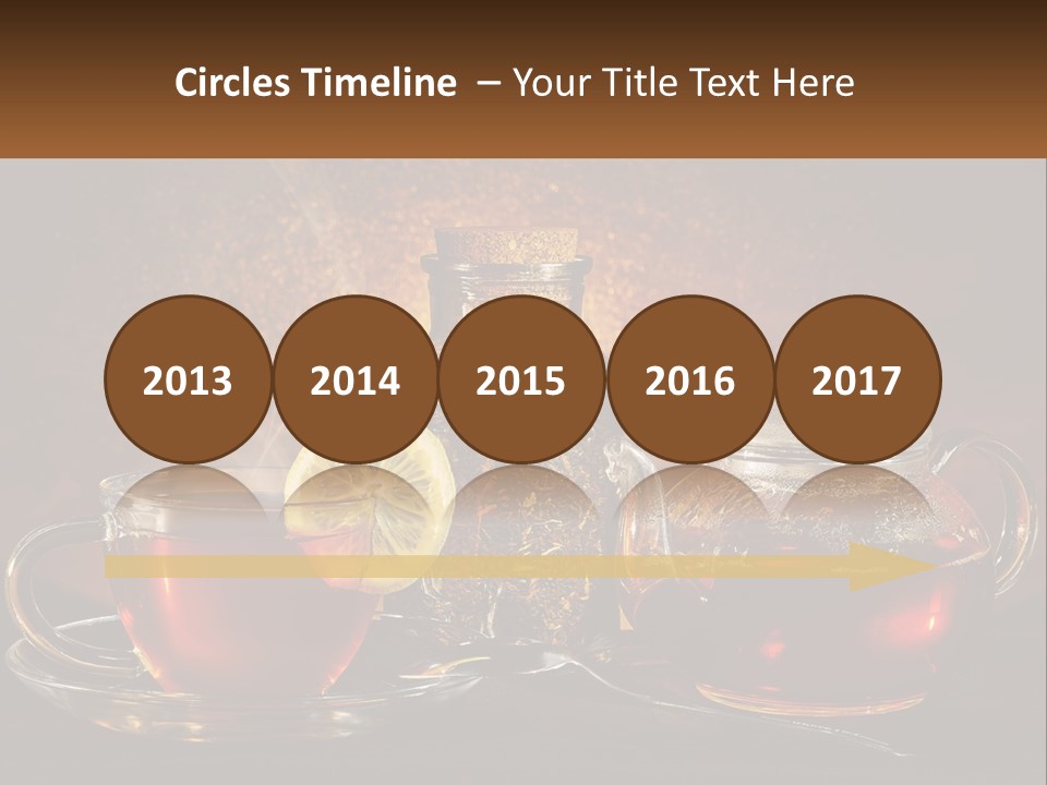 A Cup Of Tea Next To A Teapot With A Lemon On It PowerPoint Template