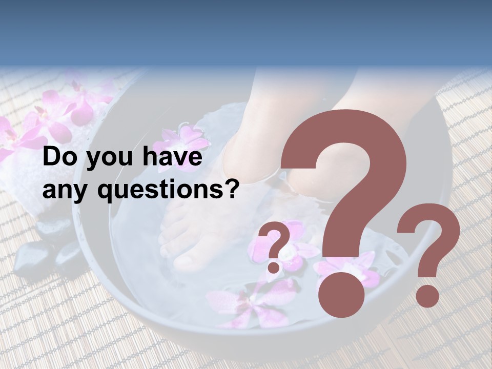 A Woman's Feet In A Bowl Of Water With Pink Flowers PowerPoint Template