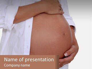 A Pregnant Woman Holding Her Belly In Her Hands PowerPoint Template