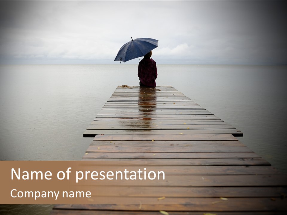 A Person Sitting On A Dock With An Umbrella PowerPoint Template