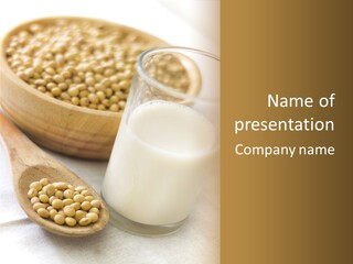 A Glass Of Milk Next To A Wooden Spoon PowerPoint Template