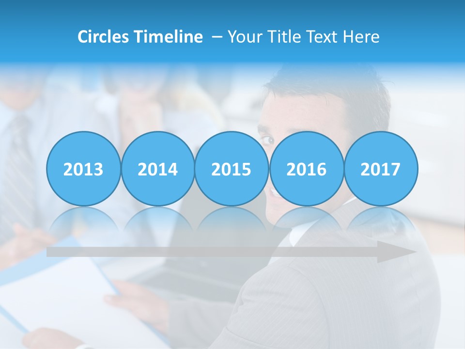 A Group Of Business People Sitting At A Table PowerPoint Template