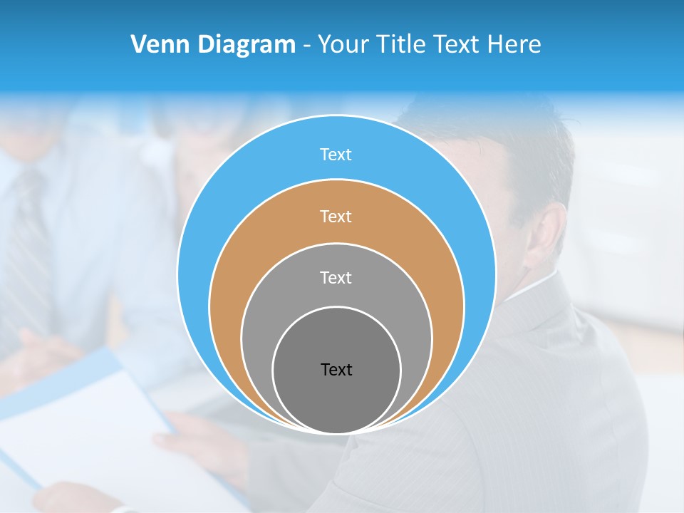 A Group Of Business People Sitting At A Table PowerPoint Template