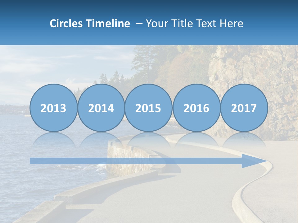 A Paved Road Next To A Body Of Water PowerPoint Template