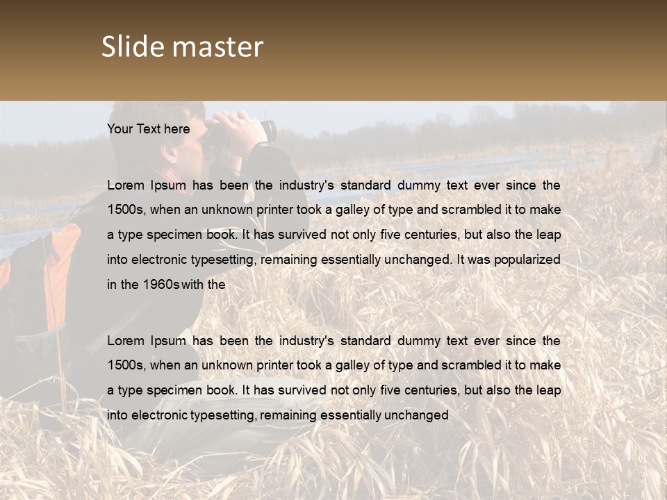 A Man Sitting In A Field Looking Through Binoculars PowerPoint Template