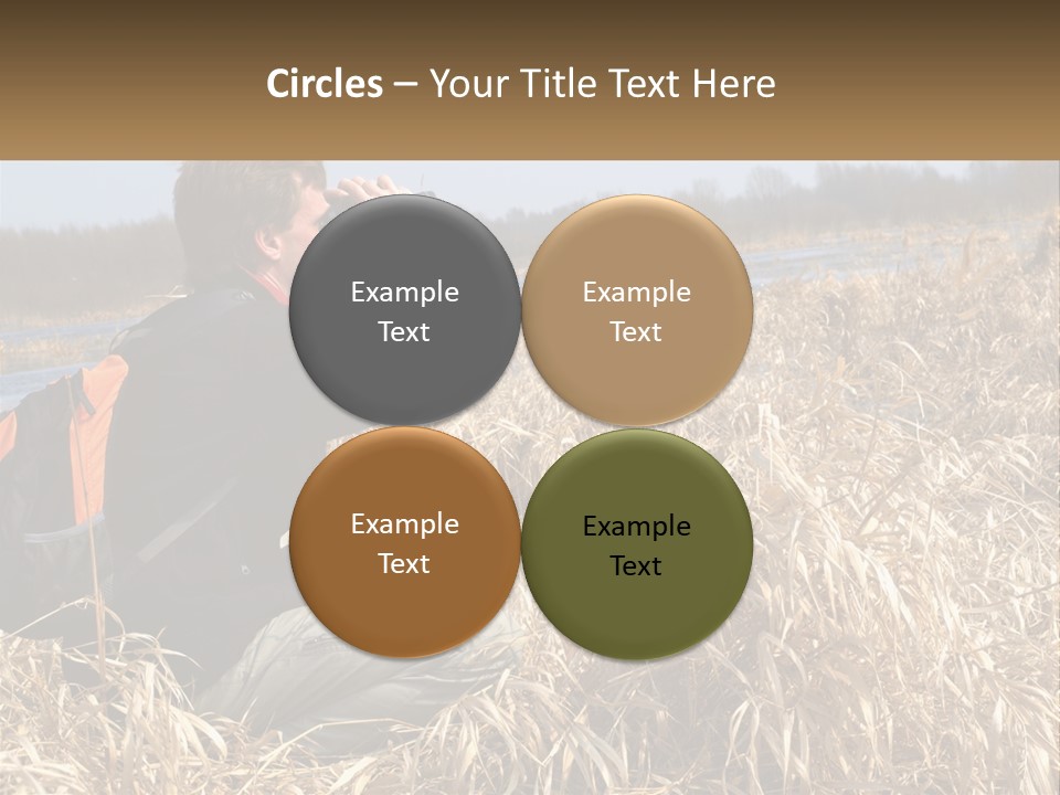 A Man Sitting In A Field Looking Through Binoculars PowerPoint Template