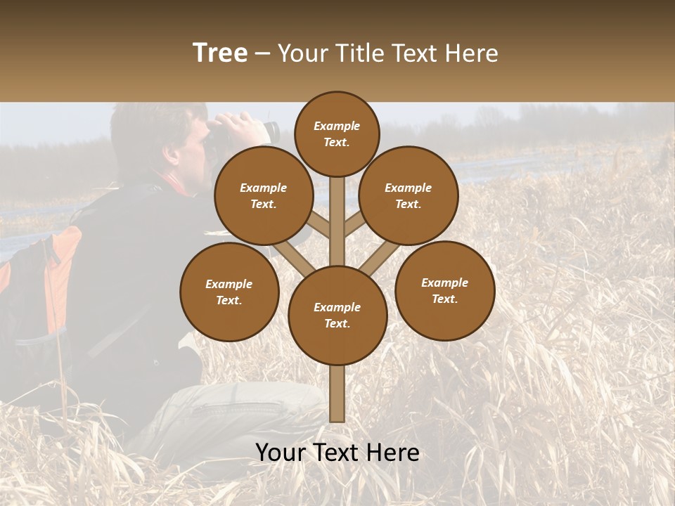 A Man Sitting In A Field Looking Through Binoculars PowerPoint Template