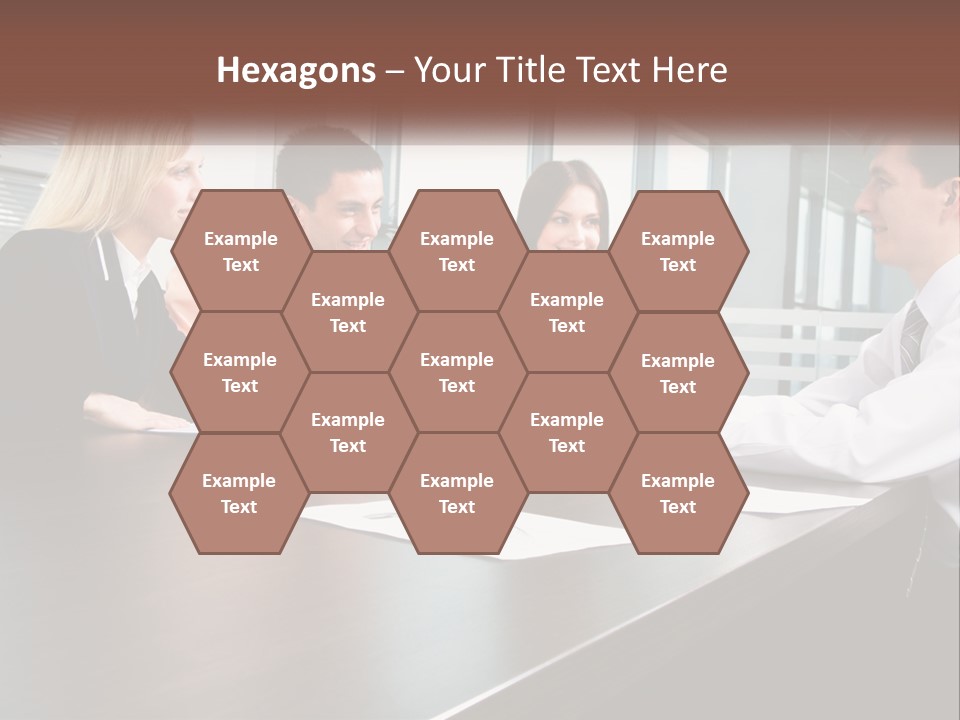 A Group Of Business People Sitting Around A Conference Table PowerPoint Template