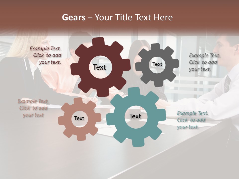 A Group Of Business People Sitting Around A Conference Table PowerPoint Template