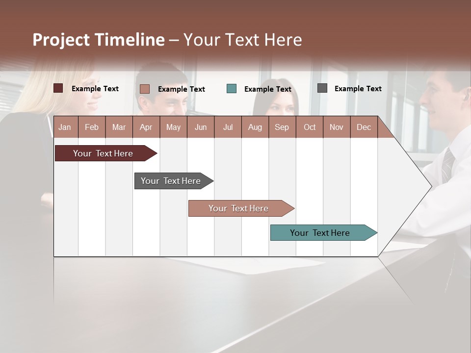 A Group Of Business People Sitting Around A Conference Table PowerPoint Template