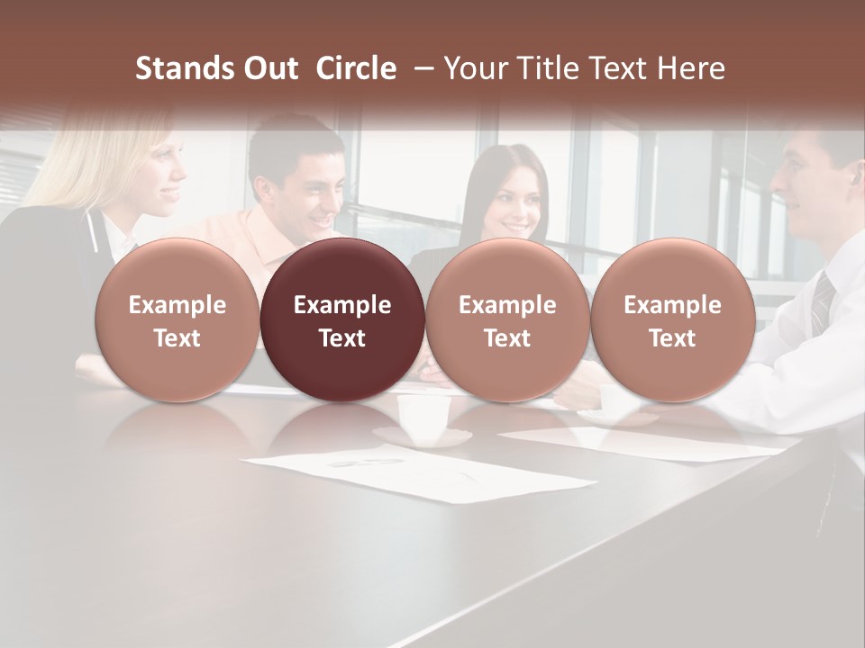 A Group Of Business People Sitting Around A Conference Table PowerPoint Template