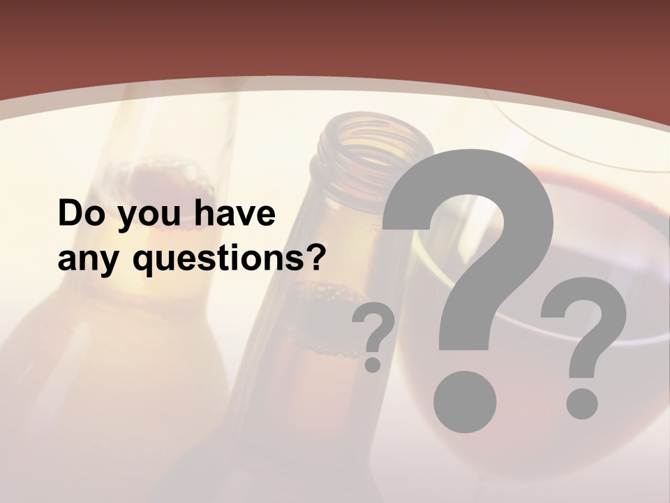 Two Bottles Of Wine And A Glass Of Wine On A Table PowerPoint Template