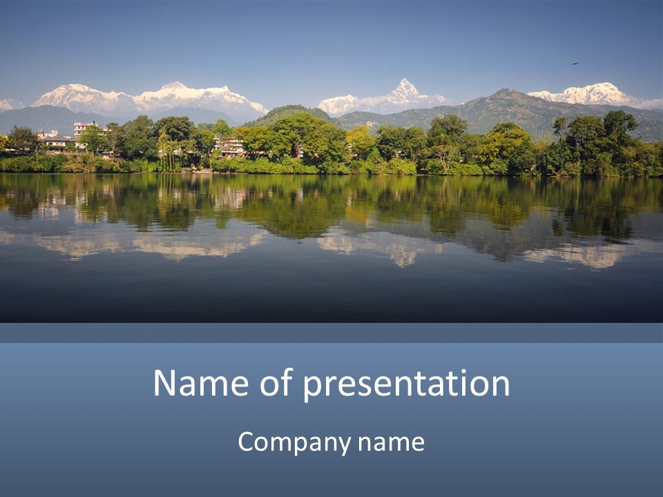 A Large Body Of Water With Mountains In The Background PowerPoint Template