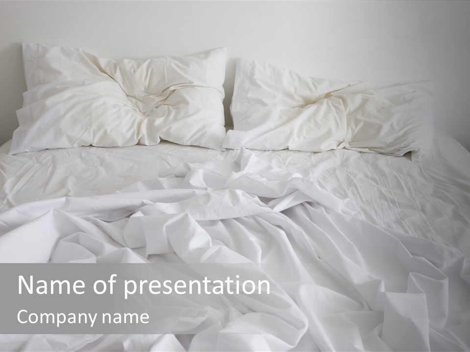A Bed With White Sheets And Pillows On Top Of It PowerPoint Template