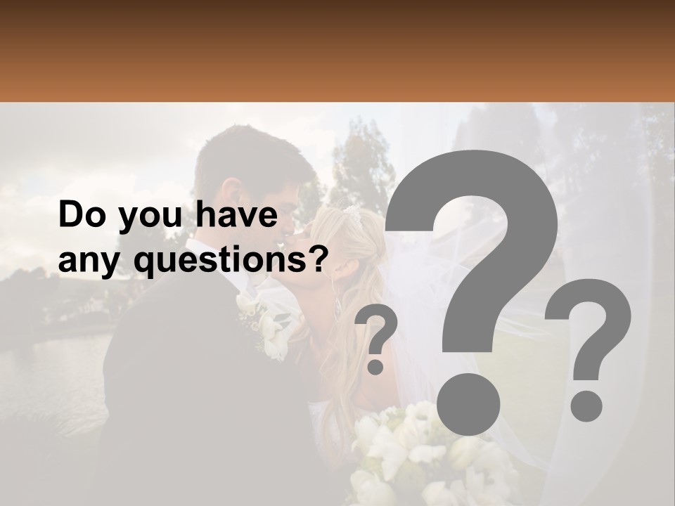 A Bride And Groom Kissing In Front Of A Lake PowerPoint Template