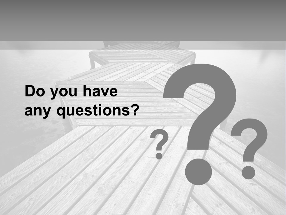 A Wooden Dock With Water And Clouds In The Background PowerPoint Template