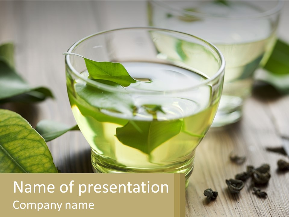 Two Glasses Of Green Tea With Leaves On A Table PowerPoint Template