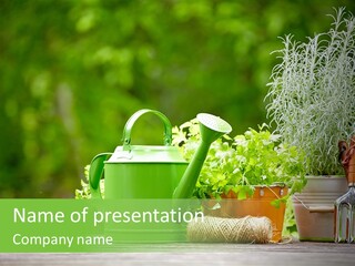 A Green Watering Can Sitting On Top Of A Wooden Table PowerPoint Template