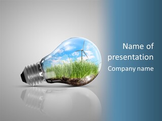A Light Bulb With Grass Inside Of It PowerPoint Template